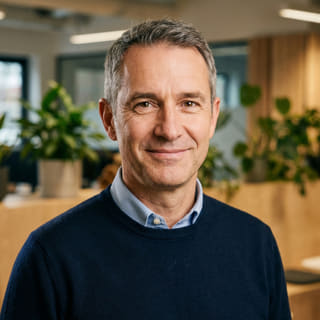 James Mitchell, listed as Chief Executive Officer at Tokium Swapode, shown in a profile image