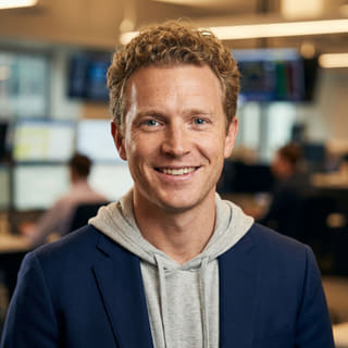 Ryan Brooks, listed as Lead Trading Analyst at Tokium Swapode, in a profile image